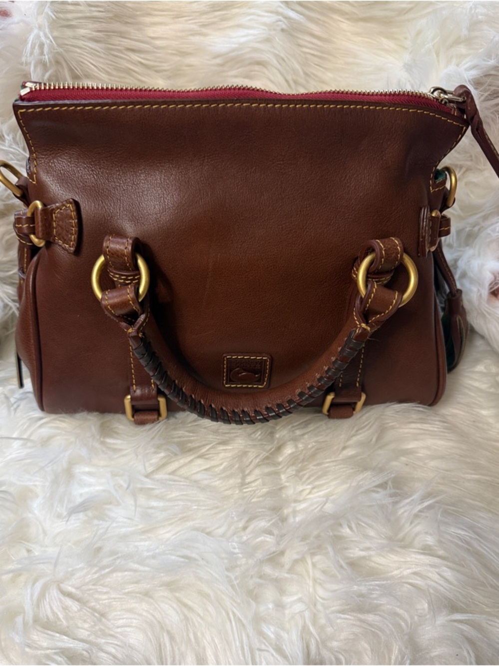 Dooney & Bourke Brown Leather Satchel with Brass Hardware and Red Zipper